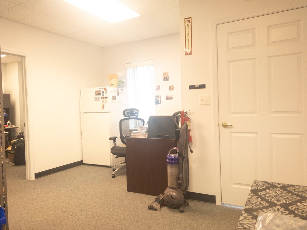 A view of an office room through the Noir 20 filter, applying a barely noticeable tint that retains the room’s natural color and light balance, with a subtle softening effect.